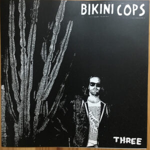 BIKINI COPS - Three